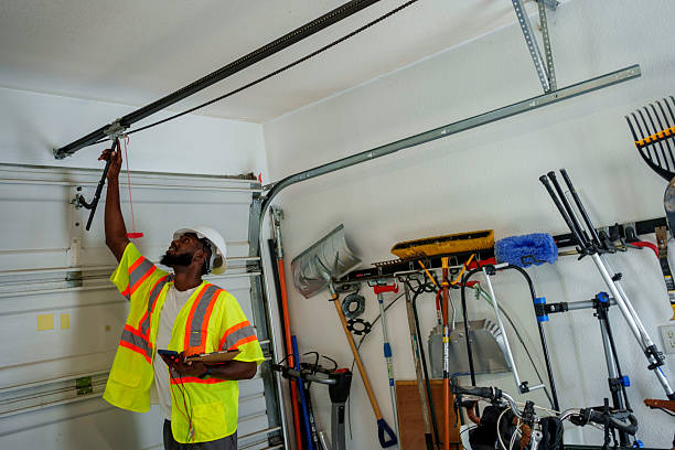 Professional Garage Door Roller Replacement technician working in Laurel Hollow, NY